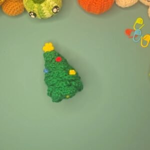 cute crochet christmas tree with a star and baubles
