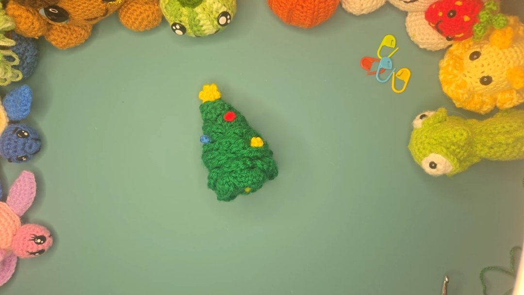 cute crochet christmas tree with a star and baubles